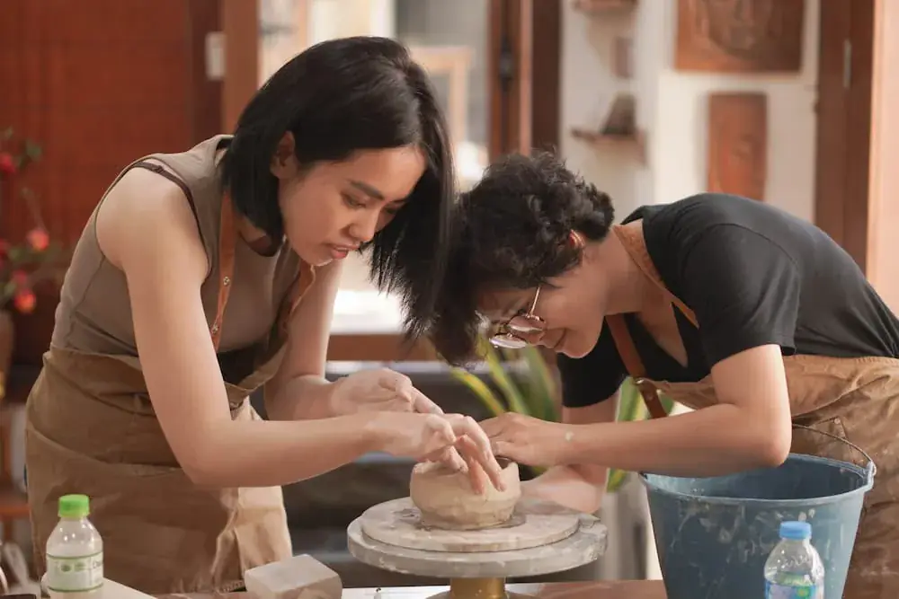 Students making pottery at Vietclay